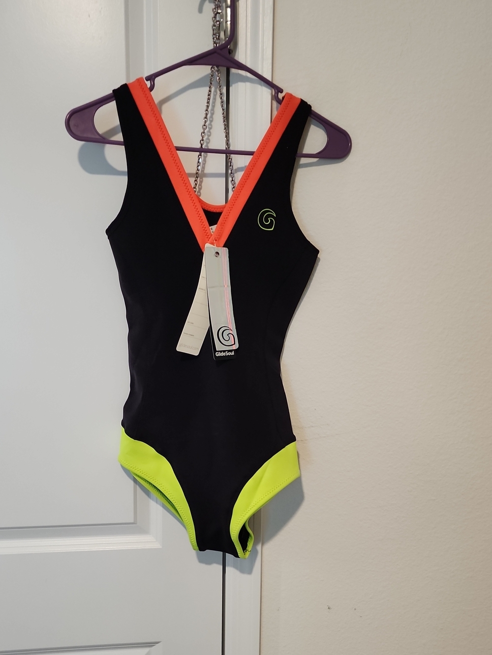 GlideSoul Girls' Black Swim Bodysuit with Neon Orange Straps and Lime Accents